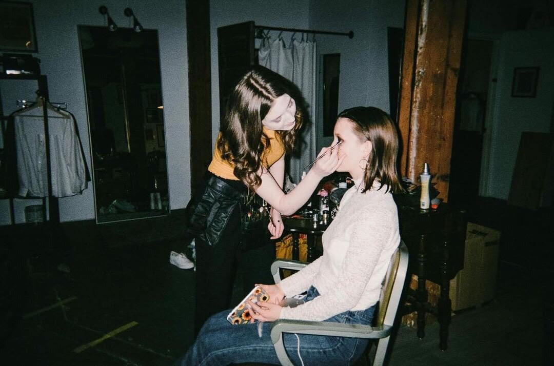 Brooke Belliveau doing makeup on model for photo shoot