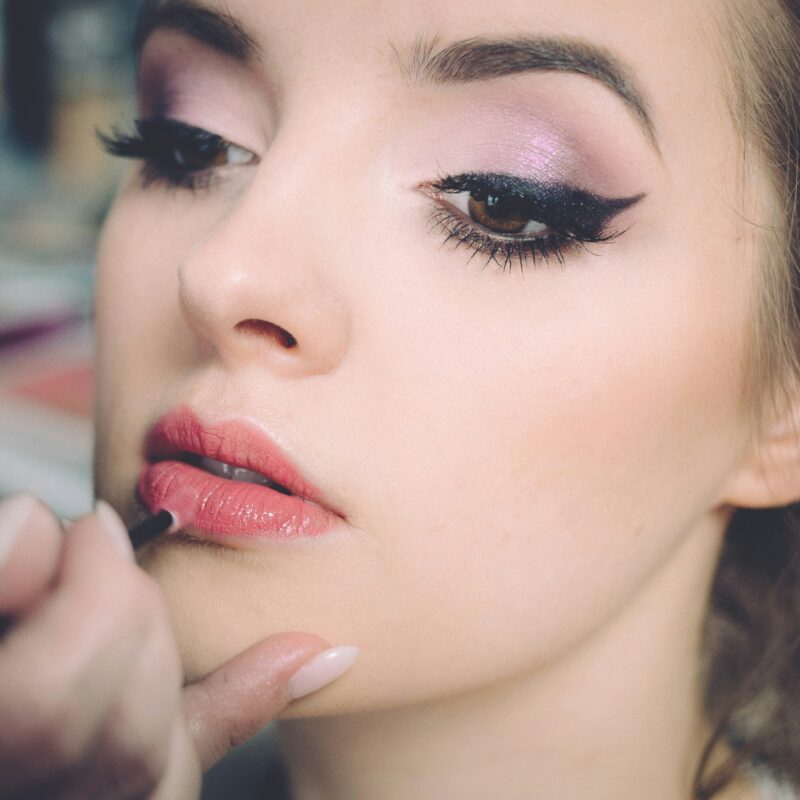 Aspiring makeup artist practicing techniques at CMU College Canada